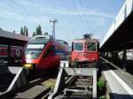 BB S-Bahn und BR 421 der SBB Cargo in Lindau Hbf am 21.08.10