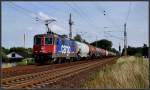 421 397-1 vor einem Kesselwagenzug aus Stendell. Stralsund -Srg- am 04.08.10