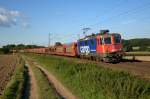 SBB Cargo Re 4/4 II / Re 421 387 zieht am 10.09.15 zwischen Vehrte und Belm einen leeren Autotransportzug in Richtung Osnabrück.