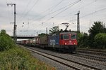 Durchfahrt am 09.06.2015 von Re 421 378-1 mit einem Containerzug in Richtung Schweiz in Müllheim (Baden).