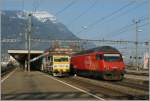 In Arth Goldau begegnen sich die SBB Re 460 029-2 des IR 2163 nach Locarno und die Re 456 093 des Voralpenexpress 2408 nach Luzern.