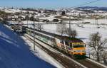 456 093 und 456 094 im Schub erklimmen die Bergstrecke von Pfäffikon nach Biberbrugg, Aufnahme am 20.02.2015 zwischen Samstagern und Schindellegi.