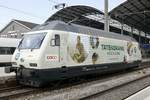 Die neue Werbelok Re 460 041  Coop Tatendrang  am 26.2.21 im Bahnhof Olten.