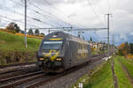 Die Re 460 072 fährt als Lokzug durch Auvernier Richtung Yverdon. Die Lok kam aus Zürich. 7.11.2023