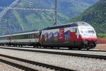 Re 460 048 mit 15 Jahre RailAway Werbung, mit dem IR nach Genf, am 15.5.2016 in Visp.
