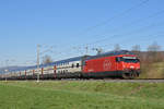 Re 460 084-7 fährt Richtung Bahnhof Sissach.