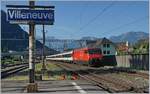 Eine SBB Re 460 fährt mit ihrem IR 90 1708 , unterwegs von Brig nach Genève Aéroport ohne Halt durch den Bahnhof von Montreux.

1. Juli 2019