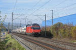 Re 460 099-5 fährt Richtung Bahnhof Itingen.