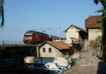 Re 460 113-4 mit IR 1719 in St-Saphorin am 28.