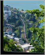 - Durchblick - An der Endhaltestelle der Standseilbahn Territet-Glion kann man die SBB Strecke unten im Tal zusammen mit einem IR Brig-Genve beobachten.