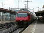 SBB - 460 074-8 vor IC bei der durchfahrt im Bahnhof Gmligen am 31.12.2012