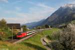 Re 460 036 mit einem IR am 20.04.2014 bei Immensee.