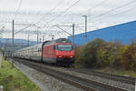 Re 460 117-5 fährt Richtung Bahnhof Itingen.