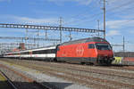 Re 460 107-6 durchfährt den Bahnhof Muttenz. Die Aufnahme stammt vom 16.02.2020.