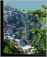 - Durchblick - An der Endhaltestelle der Standseilbahn Territet-Glion kann man die SBB Strecke unten im Tal zusammen mit einem IR Brig-Genève beobachten.