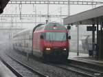SBB - 460 113-4 vor Schnellzug bei der einfahrt in den Bahnhof Herzogenbuchsee am 28.03.2013