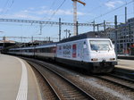 SBB - Werbelok 460 052-4 mit RE bei der ausfahrt aus dem Bahnhof Zürich am 28.05.2016