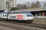 Re 460 075-5 mit der Werbung für Léman 2030, fährt Richtung Bahnhof Muttenz. Die Aufnahme stammt vom 19.02.2019.