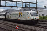 Re 460 041-7 mit der COOP Werbung, durchfährt den Bahnhof Rupperswil. Die Aufnahme stammt vom 17.07.2021.