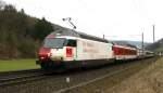 Re 460 090 mit Revisionsfuhre an 1.er und 2.er Stelle und konventionellem Personenzug dahinter auf dem Weg nach Basel SBB bei Tecknau am 14.03.2009