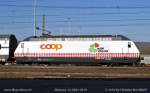 Neuste Werbelok der SBB ist die Re 460 083-9 für COOP Miini Region, hier bei der Vorbeifahrt im Bhf Muttenz am 16. März 2014.