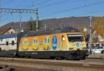 Re 460 029-2, mit der Ciquita Werbung, verlässt den Bahnhof Sissach. Die Aufnahme stammt vom 06.11.2015.