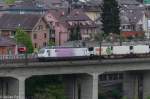 RailCare ist ein Tochterunternehmen des Detailhndlers Coop und fhrt fr diesen Containerzge innerhalb der Schweiz. Da die Zge relativ kurz sind und eine vergleichsweise hohe Geschwindigkeit fahren knnen, brauchen sie wenig Trassekapazitt und knnen so auch im stark ausgelasteten Schweizer Schienennetz sehr pnktlich verkehren. Durch ein Mietgeschft mit der BLS Cargo AG kamen vor zwei Jahren 5 Re 465 zu RailCare, im Gegensatz wurden 5 Loks der Baureihe 186 an die BLS Cargo vermietet. Die Re 465 von RailCare tragen alle eine eigene Beklebung und den Namen eines Edelsteins. Dieselbe Lackierung trugen vorher schon die 186er. Hier zu sehen ist die Re 465 017  Pink Panther , am 2. Mai 2015 auf dem Lorraineviadukt in der Stadt Bern.