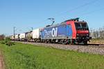 Am 05.05.2016 bespannte Re 482 012-2  ChemOil  einen Containerzug nach Aachen West/Belgien, als sie bei Hügelheim in Richtung Freiburg (Breisgau) fuhr.