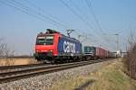 Am 08.03.2014 fuhr SBB Cargo Re 482 018-9 mit einem Containerzug am Müllheimer Ortsteil Hügelheim in Richtung Schweiz.