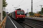 Und direkt im Anschluss von Re 482 023-9 kommt am 18.04.2014 die Re 482 001-5 ebenfalls mit einem Containerzug in die gleiche Richtung durch den Bahnhof von Müllheim (Baden).
