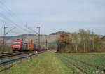 482 045-2 von SBB Cargo zieht am 17.März 2015 einen Containerzug bei Himmelstadt in Richtung Würzburg.