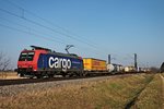 Am 07.02.2015 fuhr Re 482 023-9  fährt für SBB Cargo International  mit einem Containerzug bei Hügelheim in Richtung Schweizer Grenze.