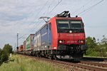 Mit einem KLV nach Italien fuhr am 12.05.2015 die Re 482 023-9  fährt für SBB Cargo International  bei Hügelheim in Richtung Schweizer Grenze.