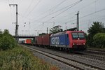 Am 10.06.2015 fuhr Re 482 008-0  Ökotrans  mit einem Containerzug durch Müllheim (Baden) gen Schweizer Grenze.