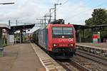 Mit dem DGS 49069 (Ludwigshafen BASF Ubf - Muttenz) fuhr am 04.08.2015 die Re 482 012-2  ChemOil  durch den Bahnhof von Haltingen in Richtung Weil am Rhein/Basel.