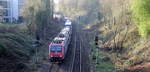 482 034-6 von SBB-Cargo kommt aus Richtung Köln,Aachen-Hbf und fährt durch Aachen-Schanz mit einem Containerzug aus Gallarate(I) nach Antwerpen-Oorderen(B) und fährt in Richtung Aachen-West. 
Aufgenommen von der Brücke in Aachen-Schanz. 
Bei schönem Frühlingswetter am Morgen vom 5.4.2019.