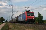 Mit dem  BASF -Zug DGS 49069 (Ludwigshafen BASF Ubf - Basel SBB Rbf) fuhr am Nachmittag des 22.05.2018 die Re 482 012-2  ChemOil  bei Müllheim (Baden) über die KBS 703 in Richtung