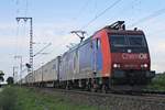 Mit einem Containerzug aus Belgien fuhr am 07.06.2018 die Re 482 011-4  ChemOil  bei Müllheim (Baden) über die Rheintalbahn in Richtung Basel.
