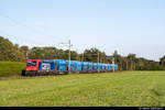 Re 482 042-9 unterwegs am 03.10.2019 mit einem Kieszug bei Pfungen ZH