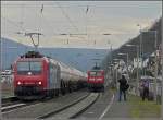 Kaum am 19.03.10 in Oberwesel angekommen, gibt es fr die Bahnfotografen schon eine interessante Zugbegegnung festzuhalten. Whrend der DB Regio den Bahnhof verlsst, donnert die SBB Cargo Re 482 027-0 mit einem Kesselzug durch denselben. (Jeanny)