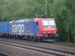 Re 482 034-6 wartet mit ihrem Containerzug am Einfahrsignal von Maschen Rbf. 26.05.2010