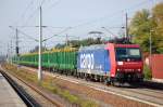 482 020-5 der SBB Cargo mit einem leeren Holzzug in Rathenow in Richtung Wustermark.