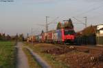 Die 482 001-5 mit einem Containerzug am Abend des 01.11.2011 bei Blankenloch.