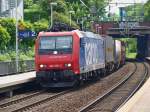 482 026-2 zieht am 20.05.2009 einen Containerzug durch den Haltepunkt Aachen-Schanz nach Aachen West.