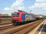 482 013 der SBB Cargo durchfhrt, am 06.07.06 den Bf Cottbus auf der Nordseite aus Richtung Guben kommend, mit einem Kesselwagenzug.