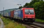 482 038-7 von Cargo ist mit einen Containerzug am 16.07.14 bei Thüngersheim unterwegs in Süden.