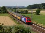 Die Re 482 047 mit einem Autozug am 25.07.2014 unterwegs bei Ergoldsbach.