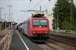 Am 25.07.2014 fuhr durch Müllheim (Baden) die SBB Cargo Re 482 015-5 mit einem Containerzug in Richtung Süden.