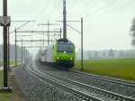 bls - 485 004-6 mit Rolla unterwegs bei Sonne mit Regen bei Lyssach am 09.04.2013