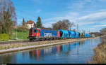 Re 6/6 11687  Bischofszell  fährt am 23. März 2017 mit einem Kieszug am Kanal bei Bürglen TG vorüber.